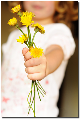 young girl holding flowers