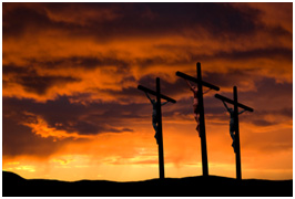 three crosses at sunset