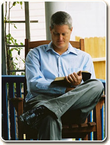 man studying bible