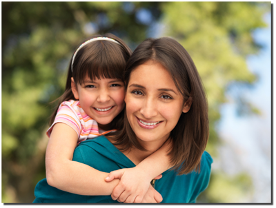 smiling mother and daughter