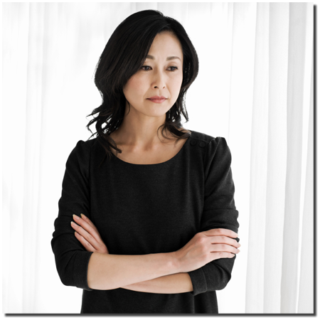 woman standing with crossed arms