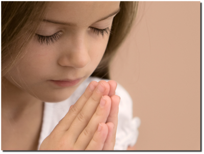 young girl praying