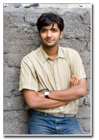 man standing against wall
