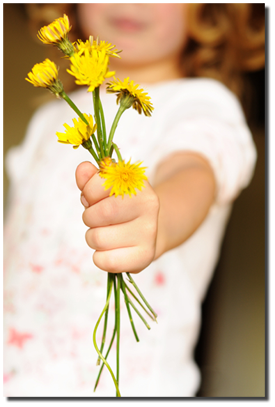young girl holding flowers