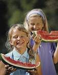 children eating watermelon